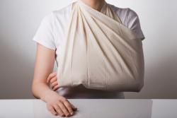 Person from Lawrence, MA with their arm in a sling